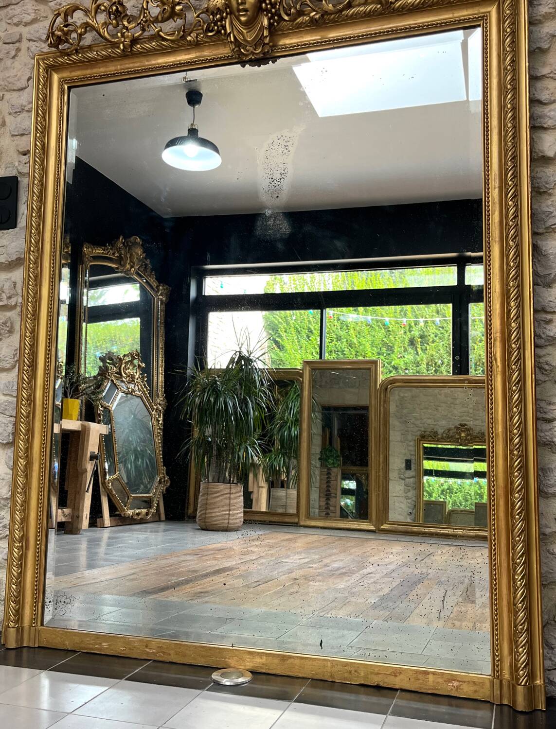 Pedimented mirror 184.5cm/135cm gilded with gold leaf