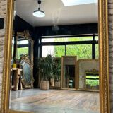 Pedimented mirror 184.5cm/135cm gilded with gold leaf