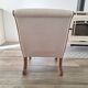 Vintage gondola armchair in beige linen fabric.