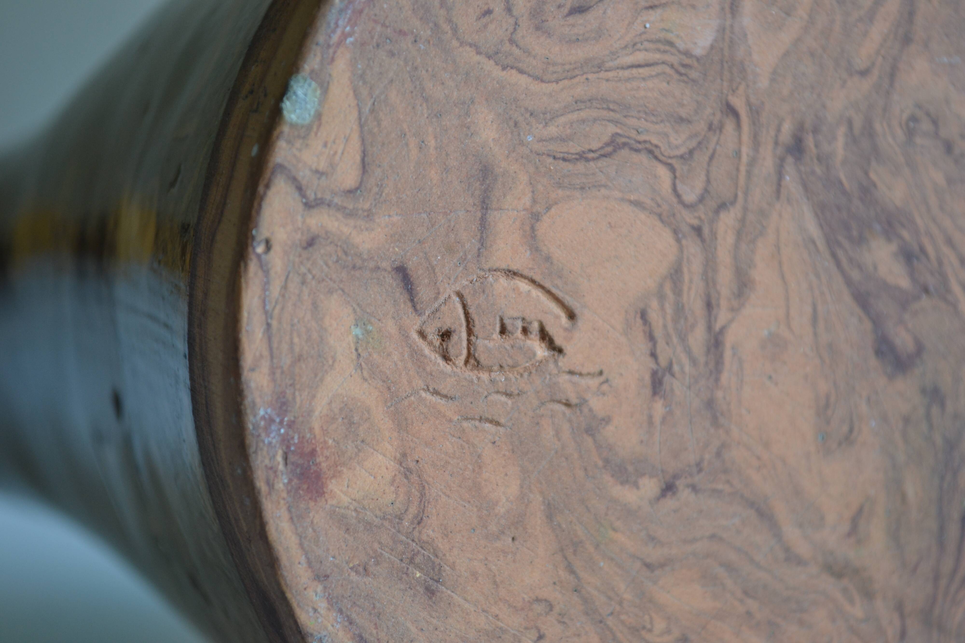 Bottle vase with an off-centre neck in ceramic, signature with a fish to be identified.
