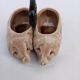 Old ceramic salt and pepper shaker in the shape of pigs.