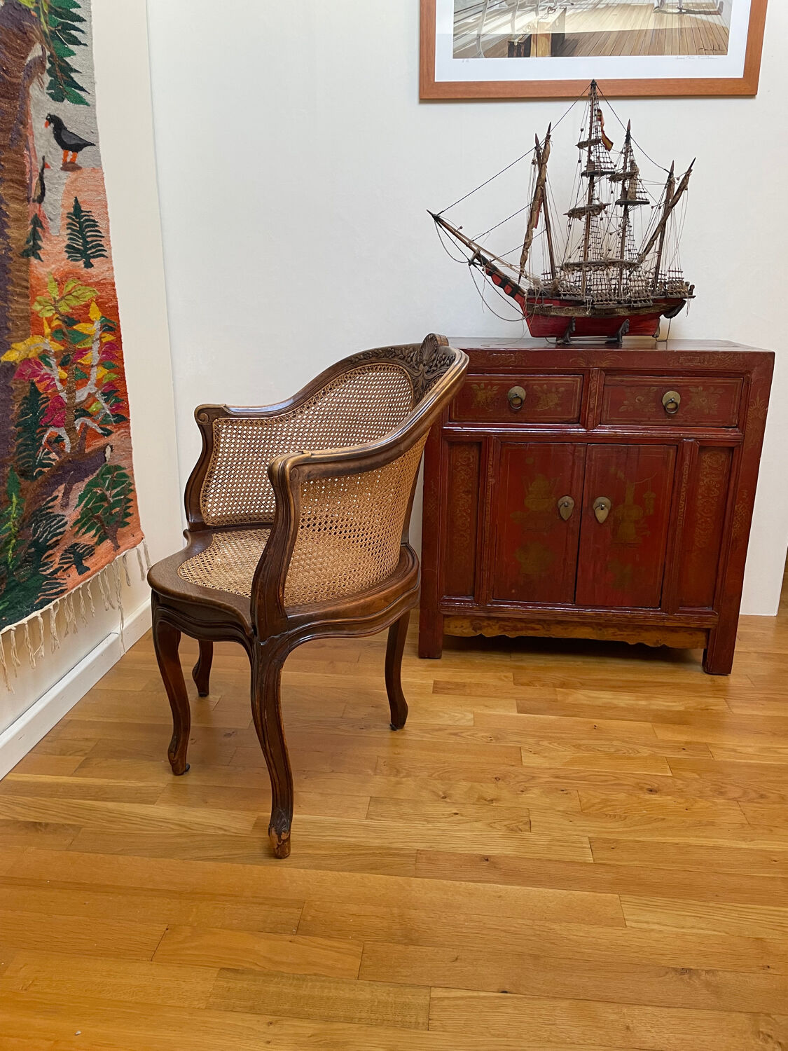 Cane seat armchair from the 19th century in the Louis XV style, known as "couillard".