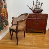 Cane seat armchair from the 19th century in the Louis XV style, known as "couillard".