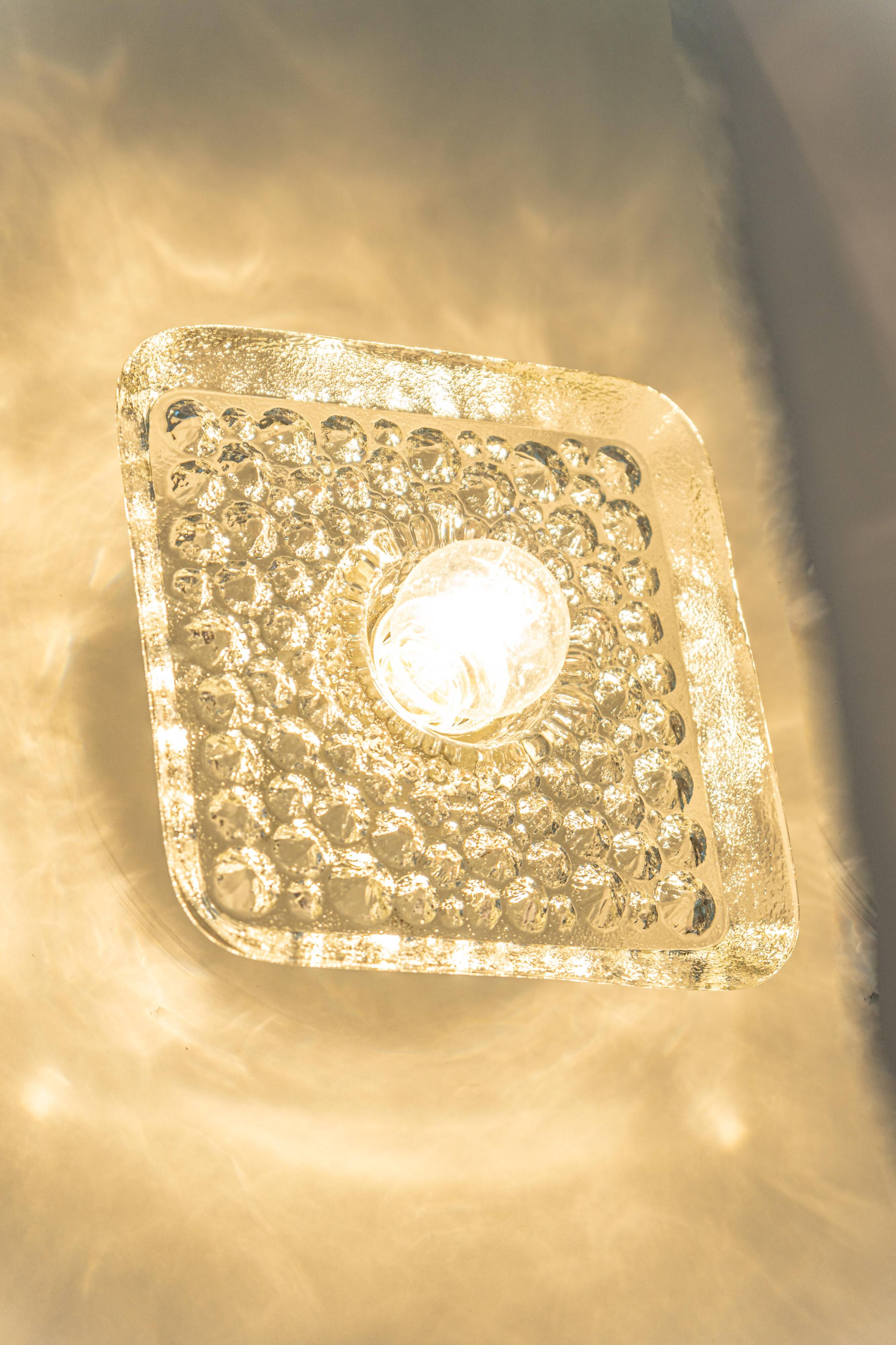 Exclusive Sputnik wall sconces in crystal by Peill & Putzler, Germany.