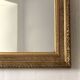 Small wooden mirror with gilded stucco in the Louis XVI style.
