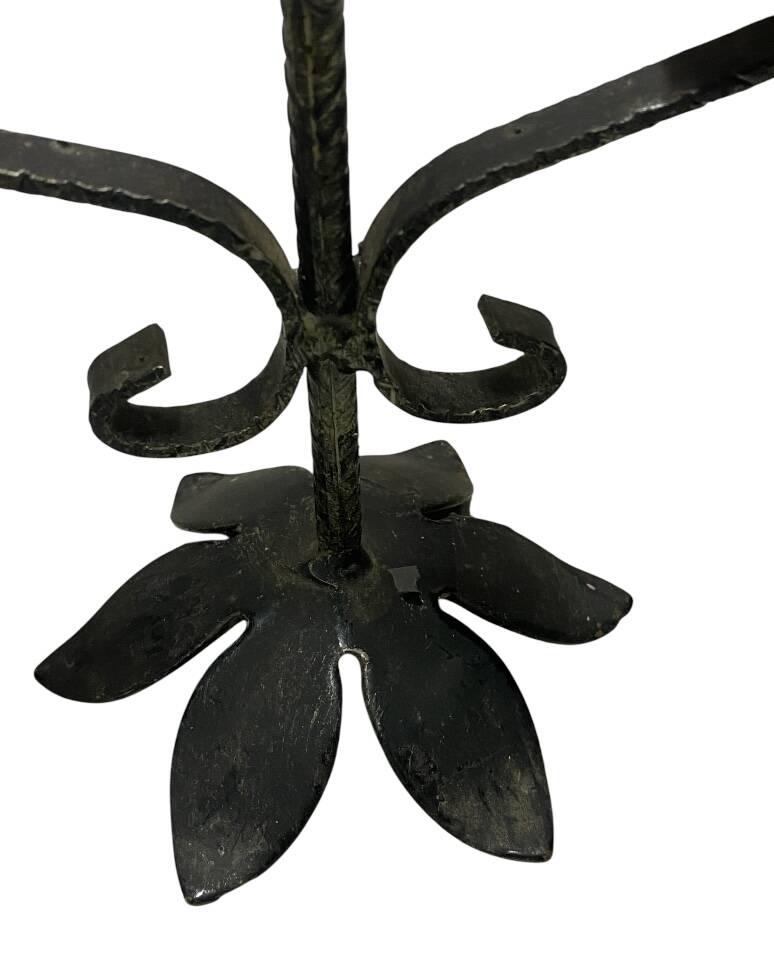 Cast iron candle holder