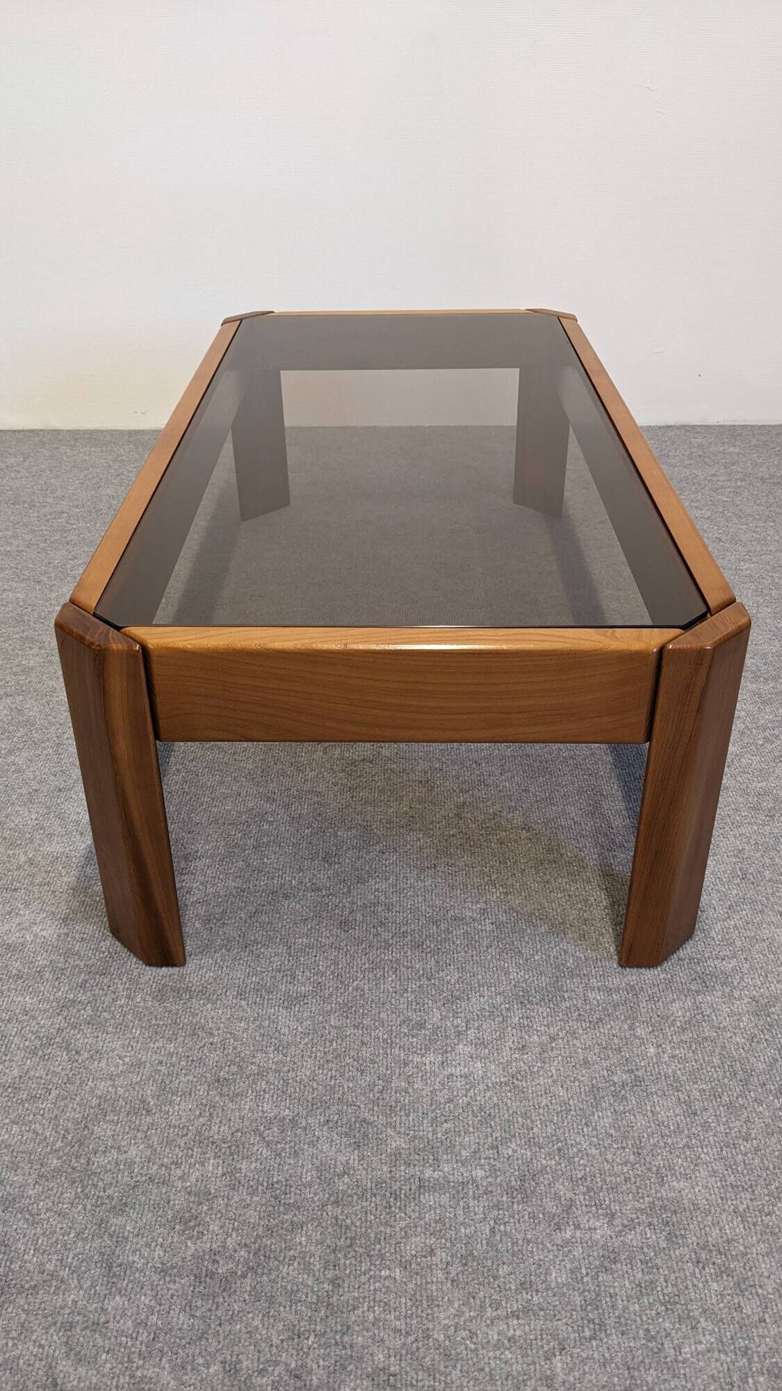 Modernist coffee table in elm and smoked glass, Italy circa 1970.