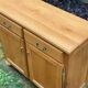 Solid oak sideboard. Three drawers.