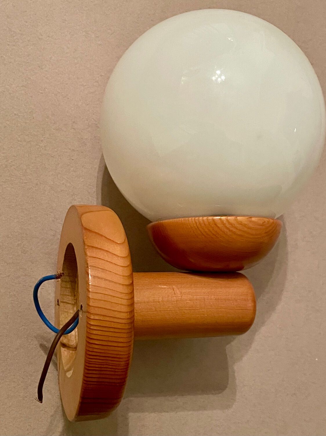 Vintage white glass wall light and pin.