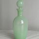Opaque light green glass vial