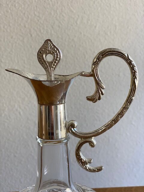 Glass and silver metal ewer