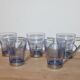 Set of 5 vintage blue-tinted glass cups with metal holders.