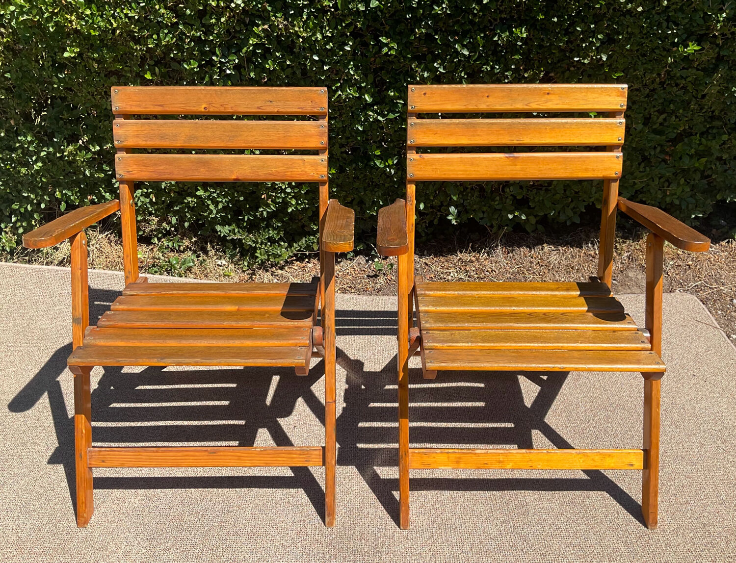 Pair of vintage wooden folding armchairs