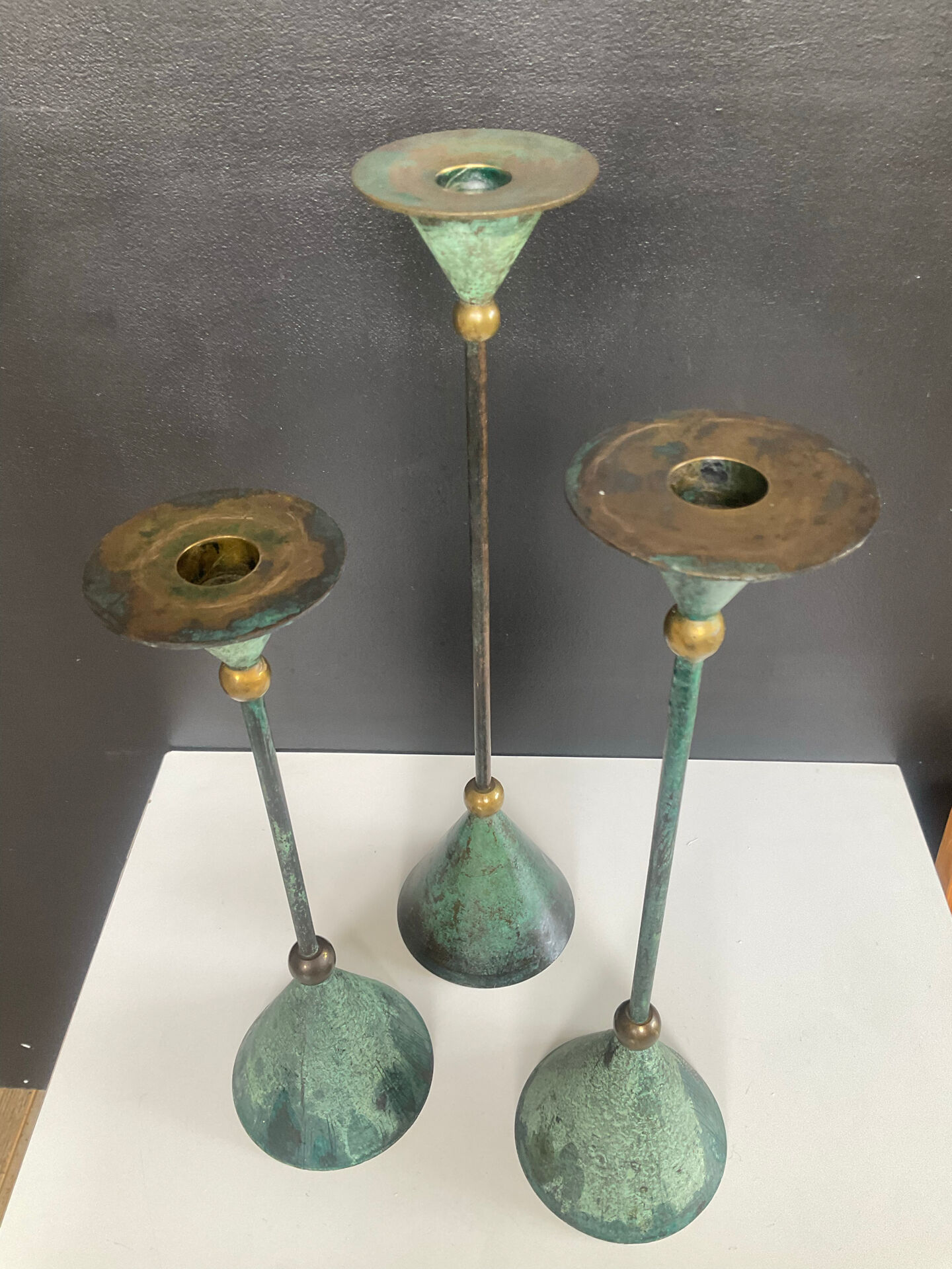 Postmodern metal candlestick trio