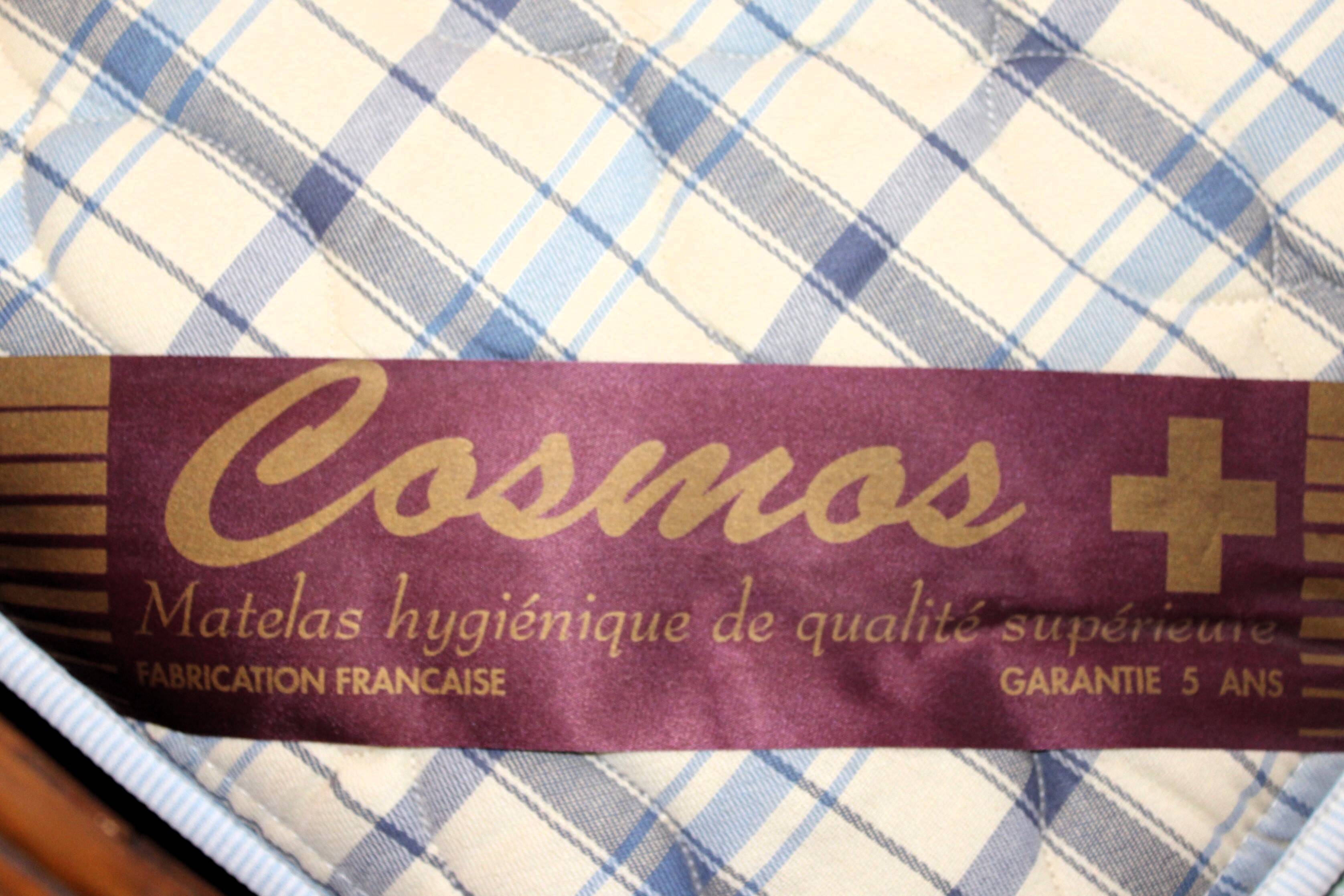 Walnut rocaille bed from the early 20th century.