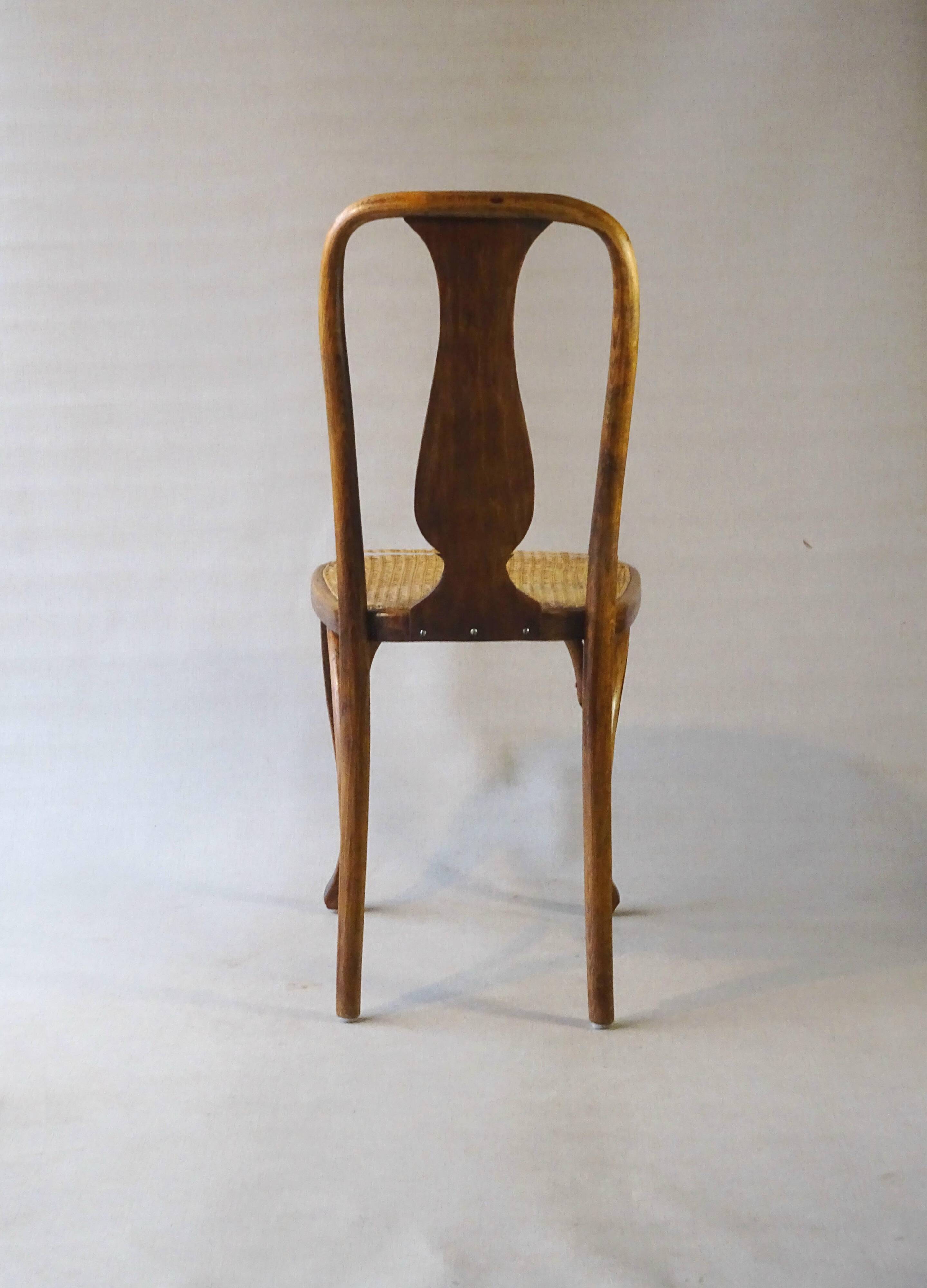 Two Kohn chairs, No. 529, circa 1910, bistro style, caned, bentwood