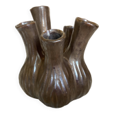 Tulip vase with ceramic flowers in brown and gold.