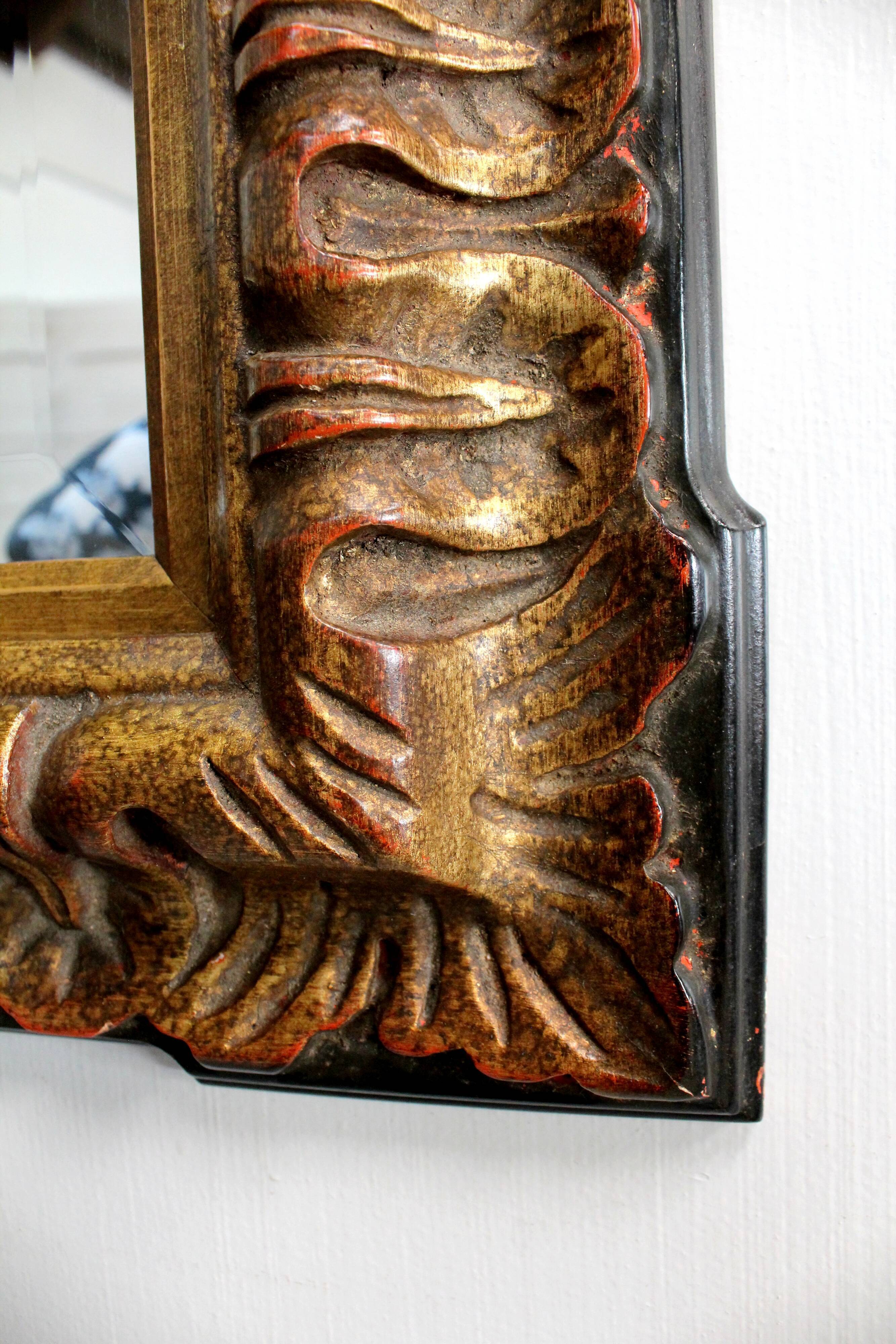 Gold-tinted wooden and stucco rectangular mirror - 1920