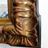 Gold-tinted wooden and stucco rectangular mirror - 1920