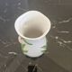 Vase in slipware with Arum flowers