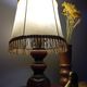 Rustic turned wood table lamp with vintage leather shade