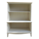 Vintage library enhanced in beige, wooden top.