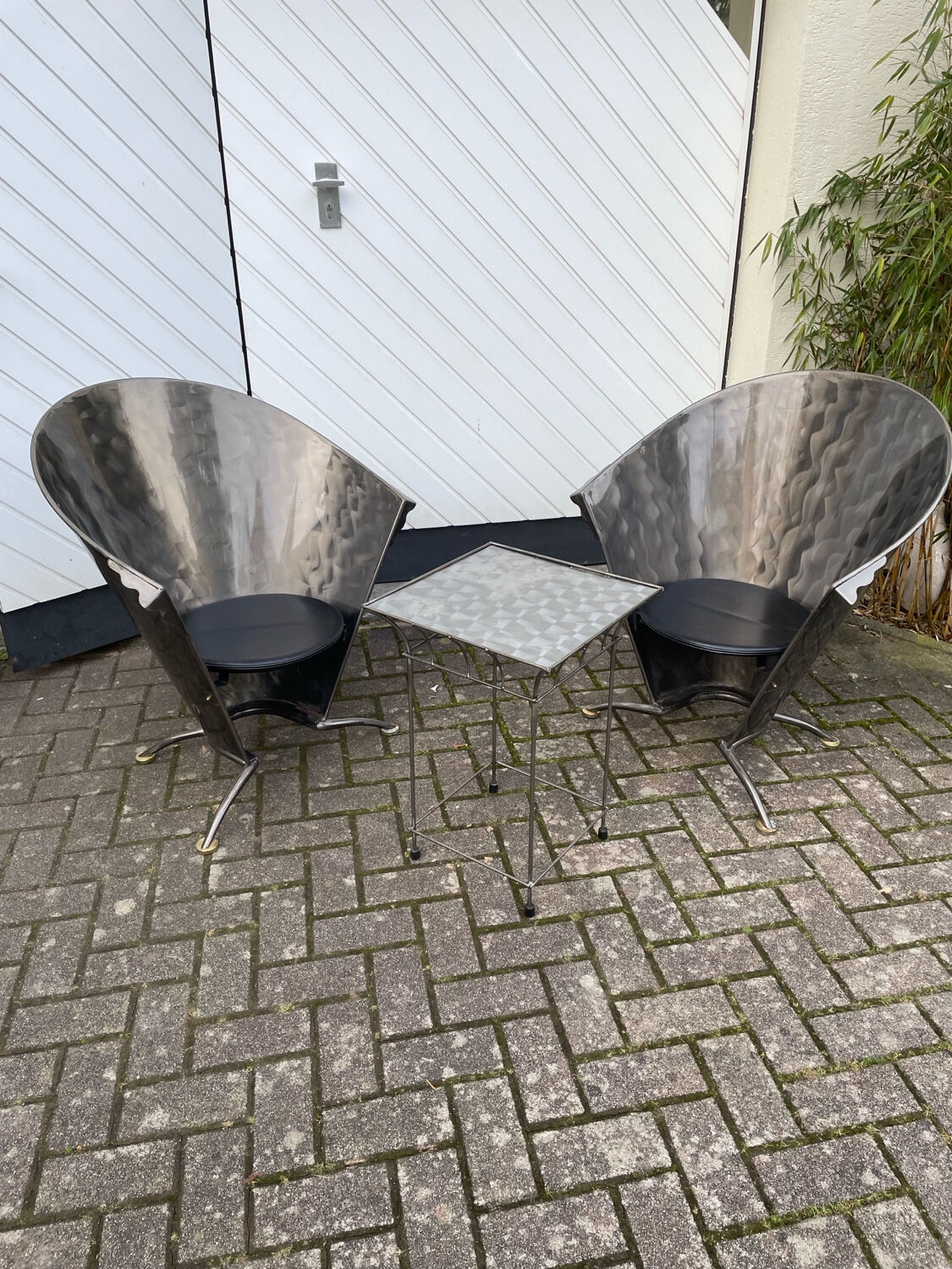 2 cone chairs and a table by Steel-Line