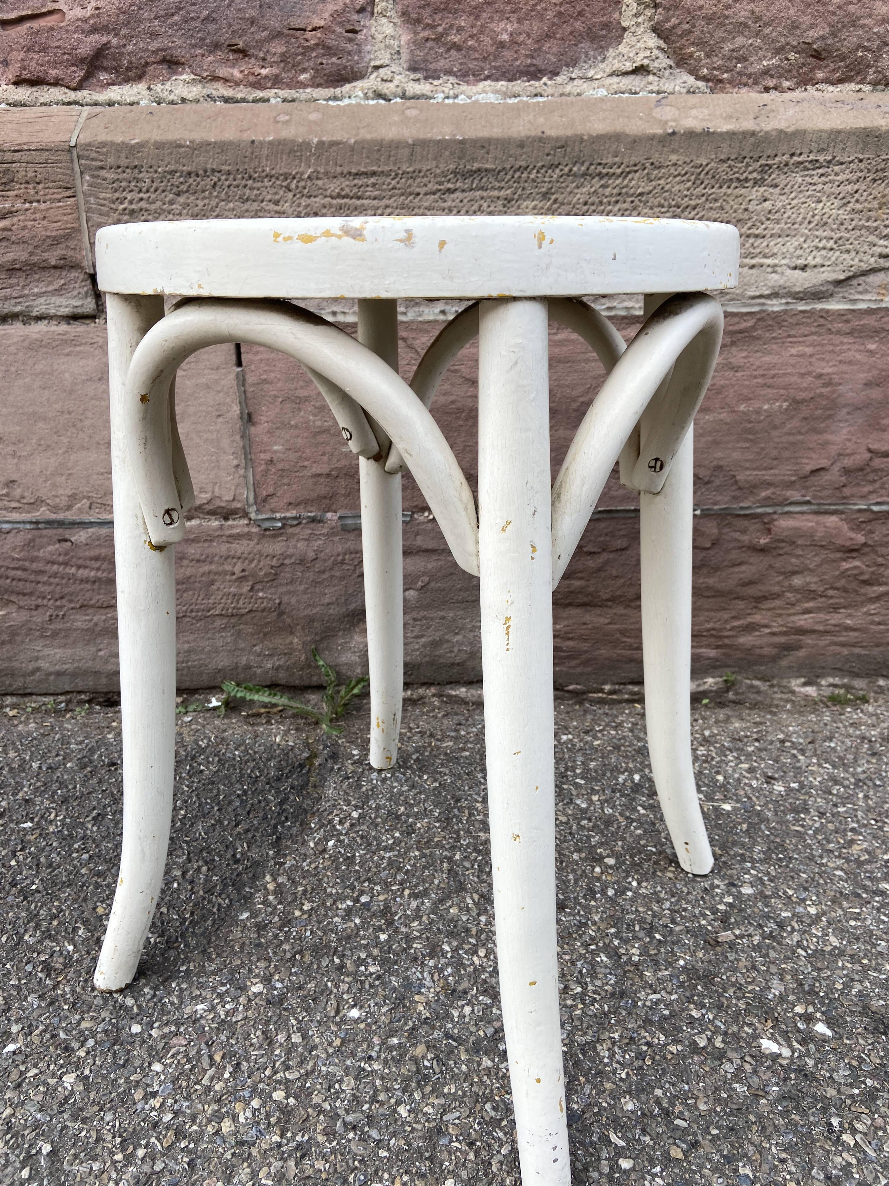 Vintage curved wooden stool