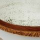 Antique oval mirror with beveled glass in wood and stucco, 19th century