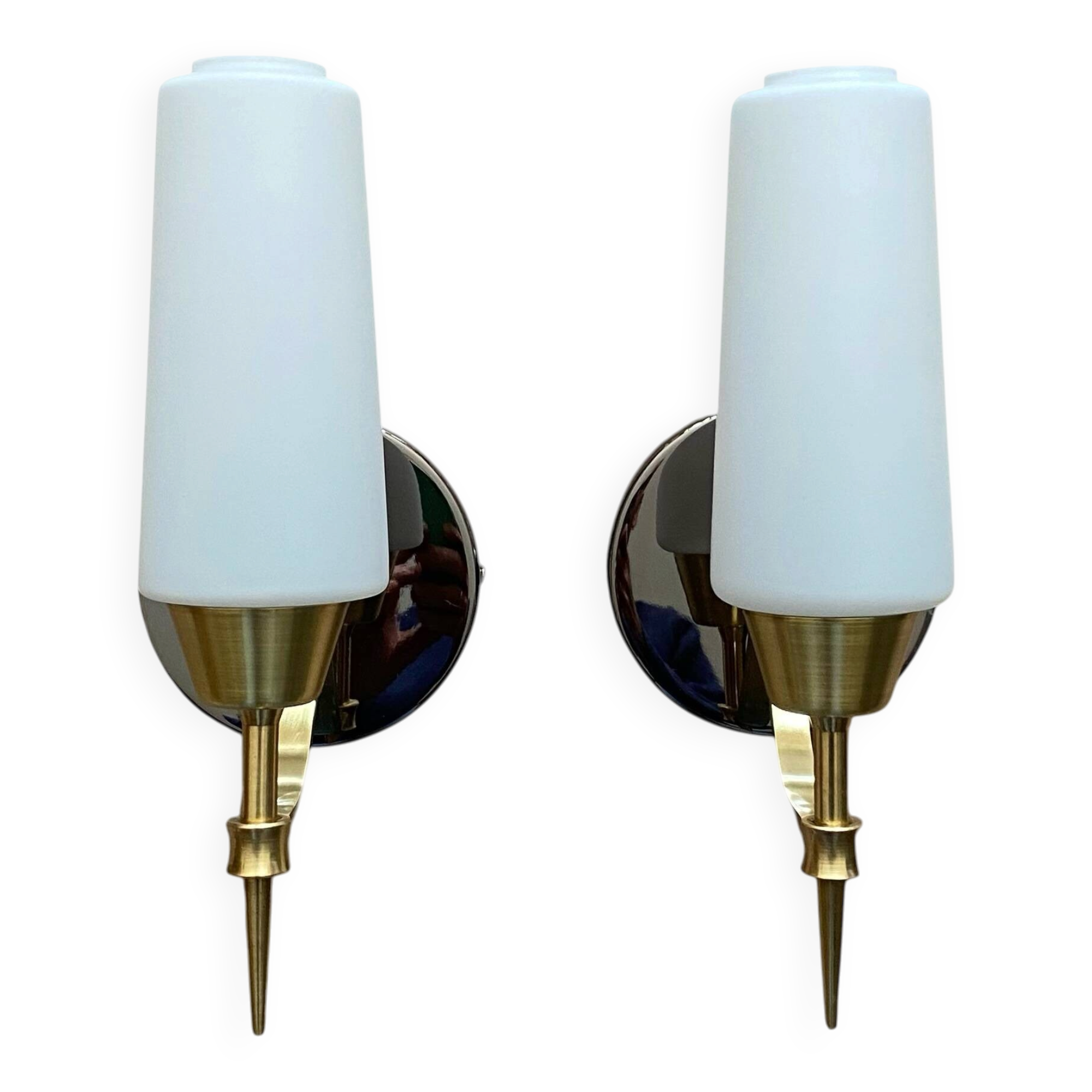 Pair of wall sconces in brass with white glass tulips.