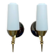 Pair of wall sconces in brass with white glass tulips.