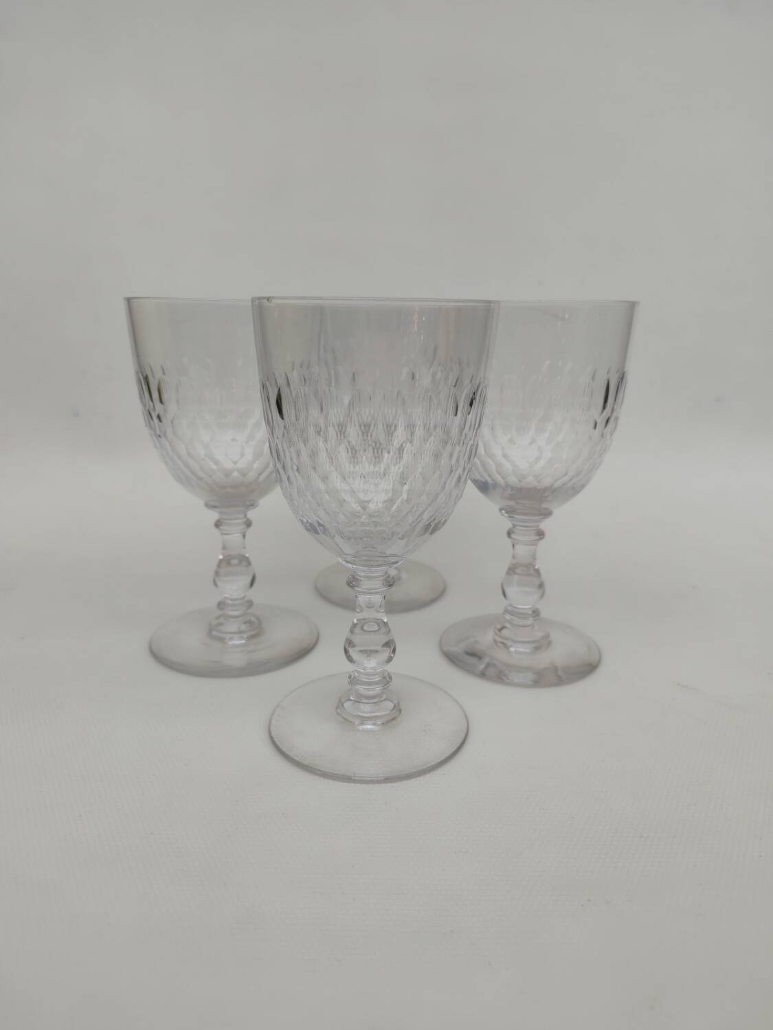 4 large crystal glasses by Baccarat, model Scales, from around 1920.