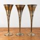 Set of 3 vintage silver-plated and gold footed cups.