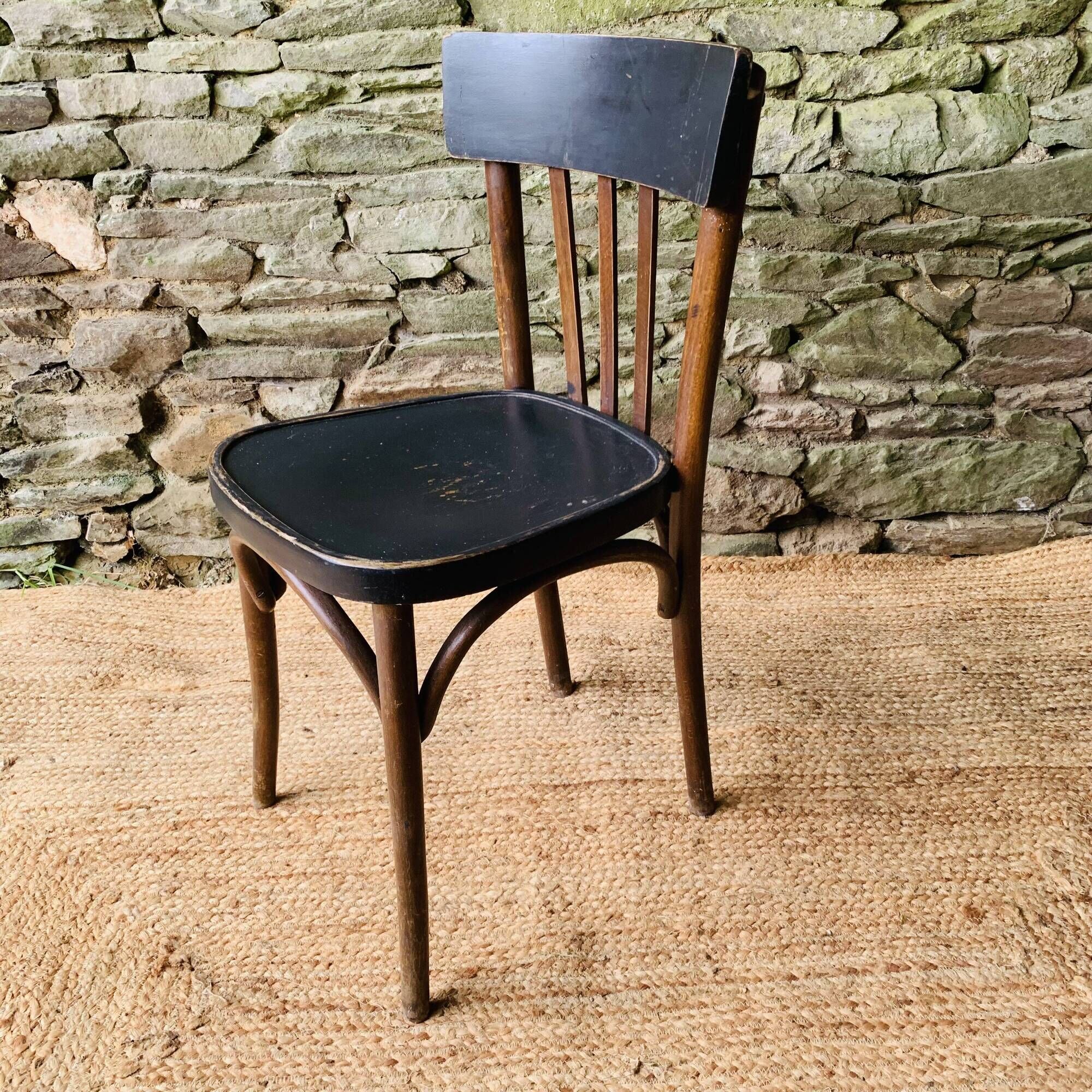 Set of four vintage bentwood bistro chairs.