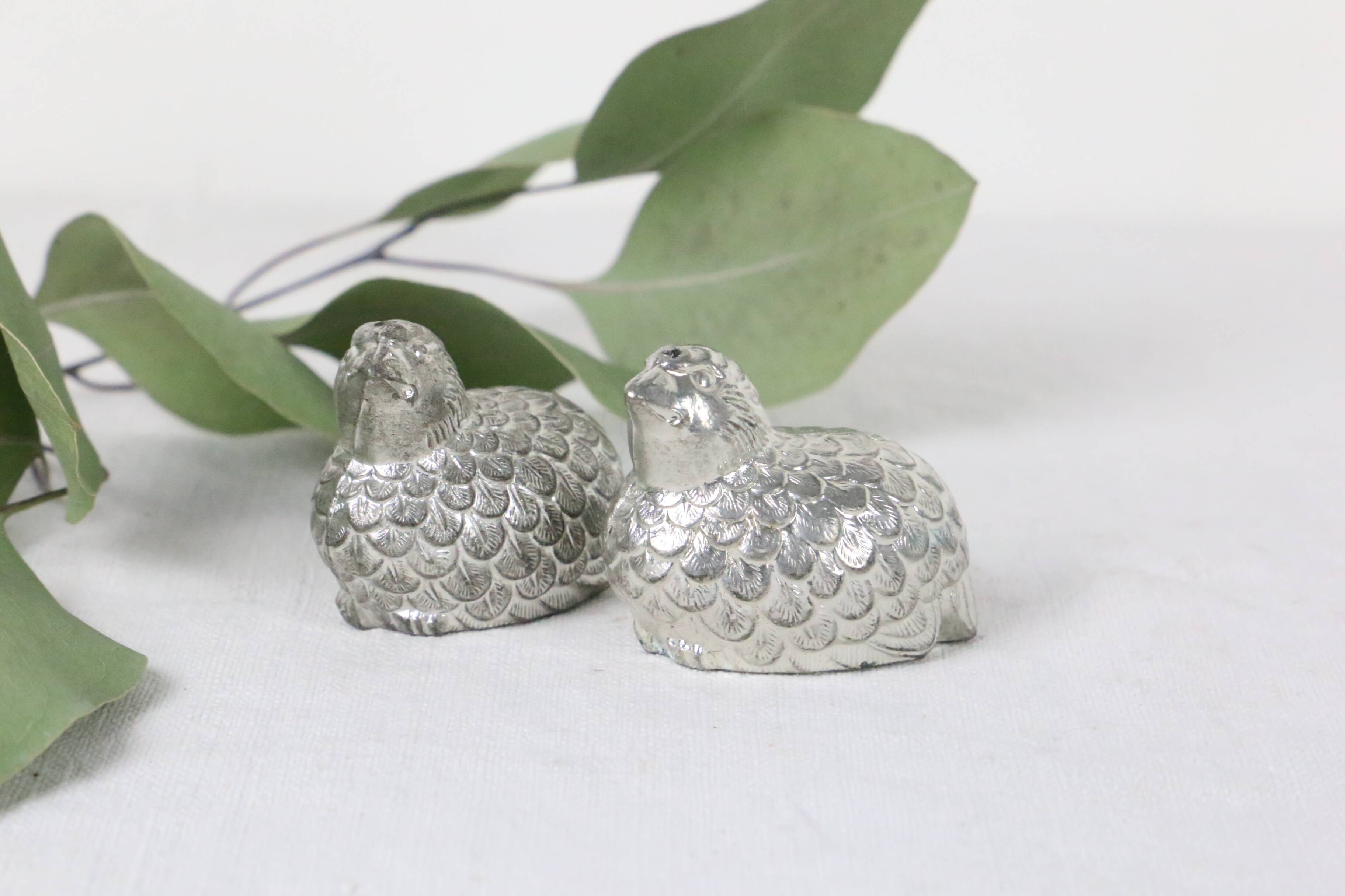 Metal salt and pepper shakers depicting two quails, 1970