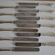 12 couteaux de table ancien metal argente monogramme