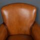 Paire de fauteuils club en cuir