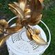 Golden metal palm tree lamp by Hans Kogl, three lights.