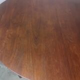Scandinavian extendable round dining table in teak