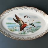 Plat ancien en porcelaine de Limoges