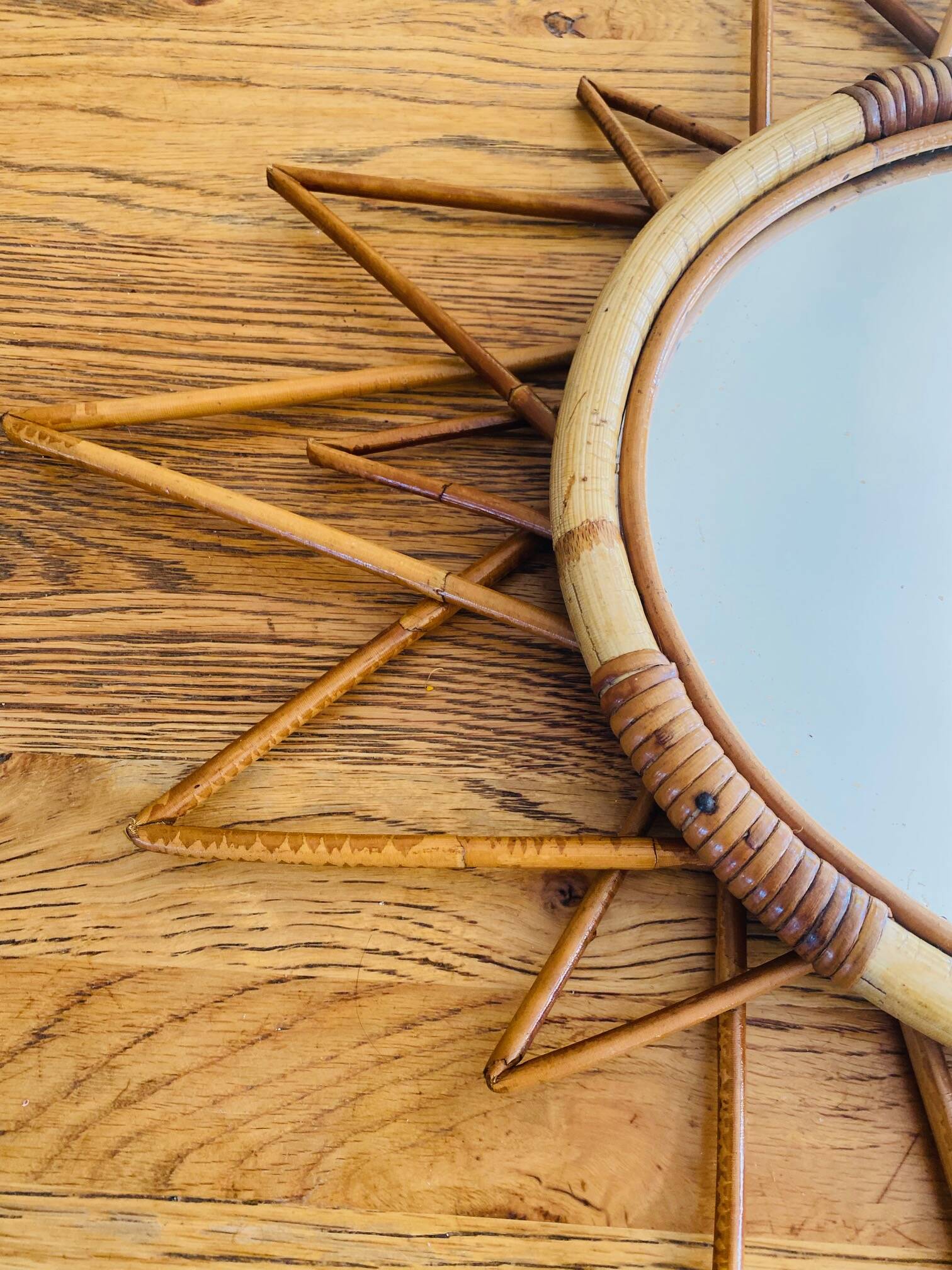 Vintage 60s/70s rattan sun mirror.