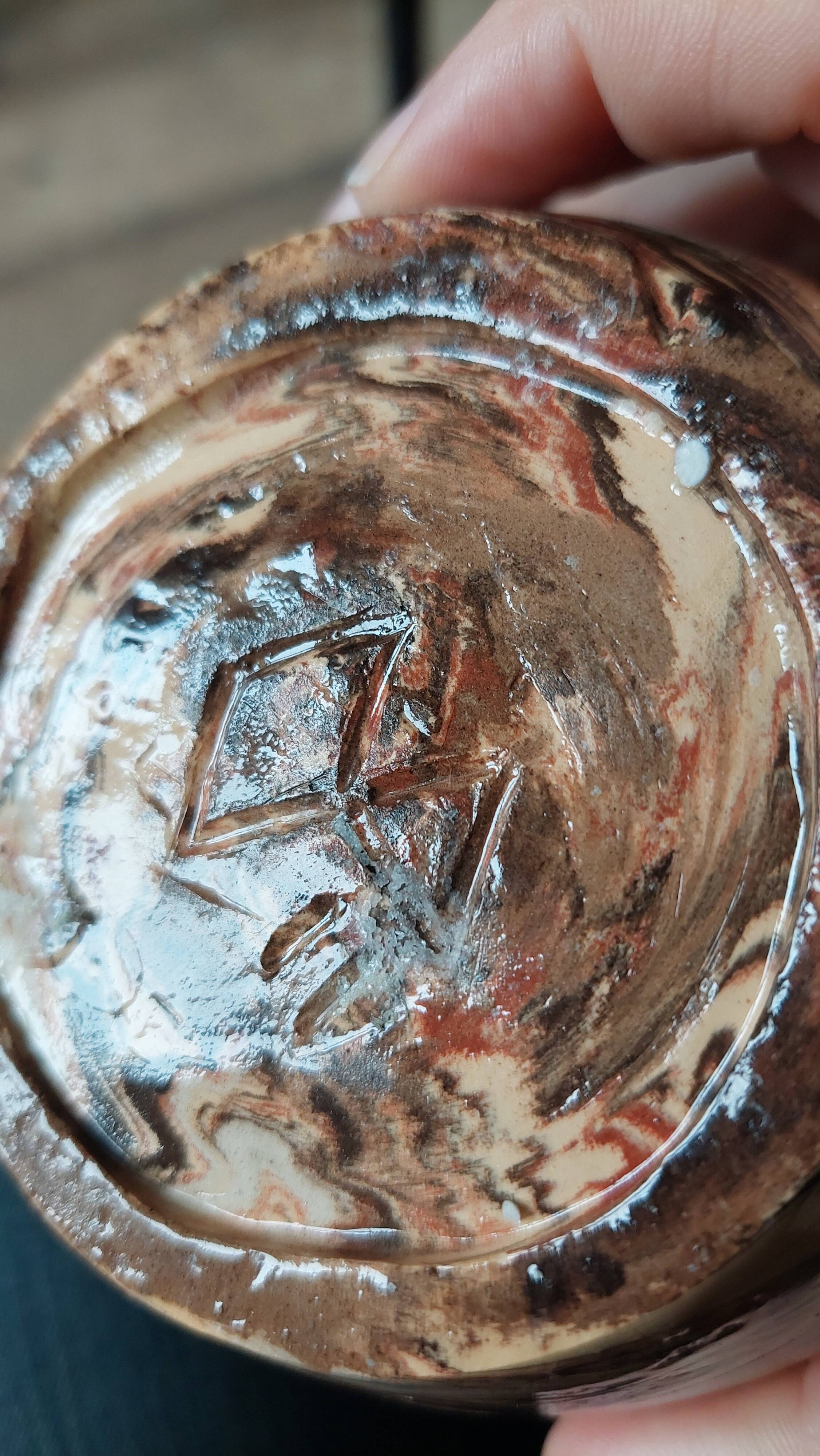 Sand, terracotta and brown soliflore vase in mixed earth