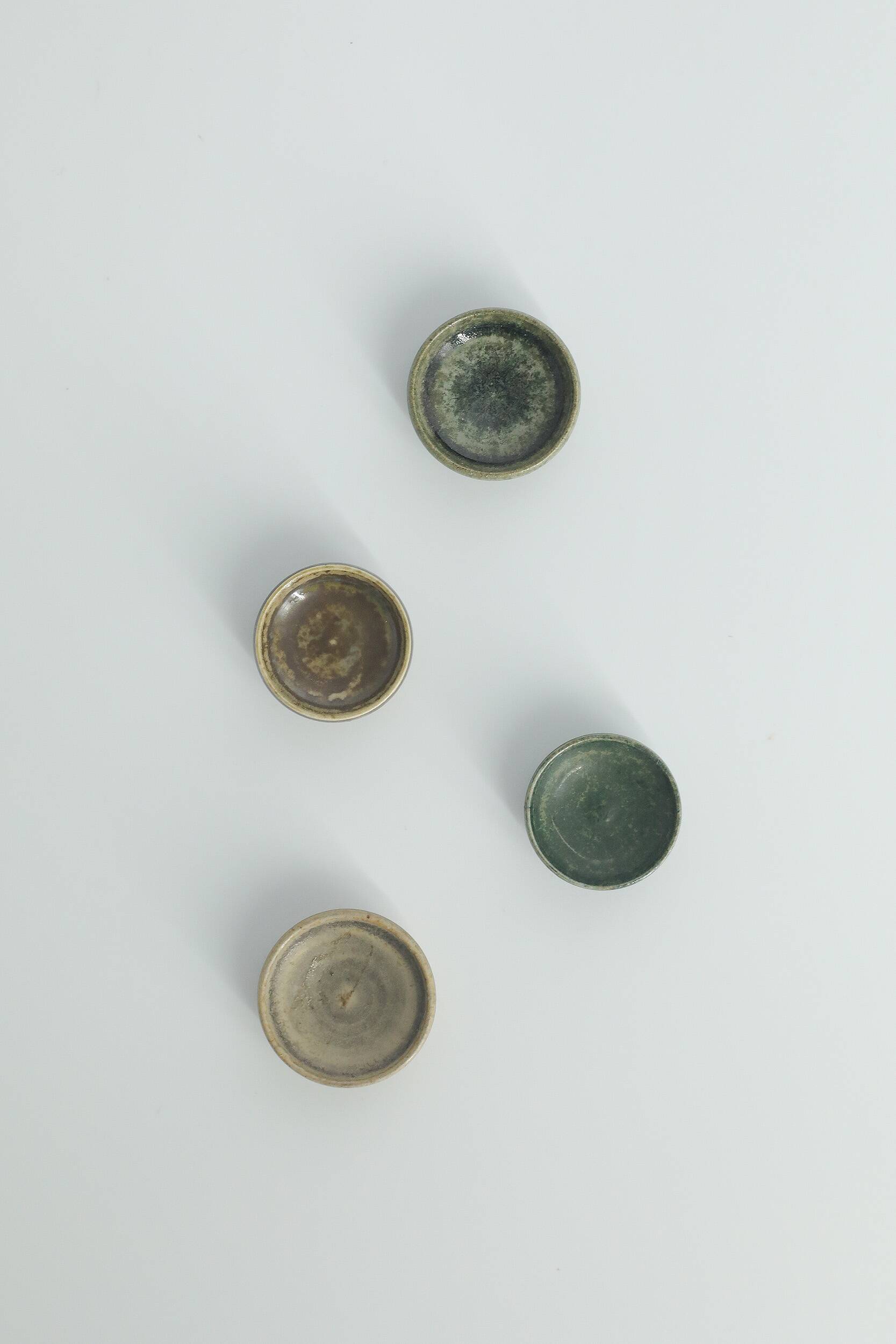 Set of 4 Scandinavian collection bowls in brown and green stoneware, mid-20th century.