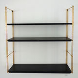 Modular wall shelf in twisted brass