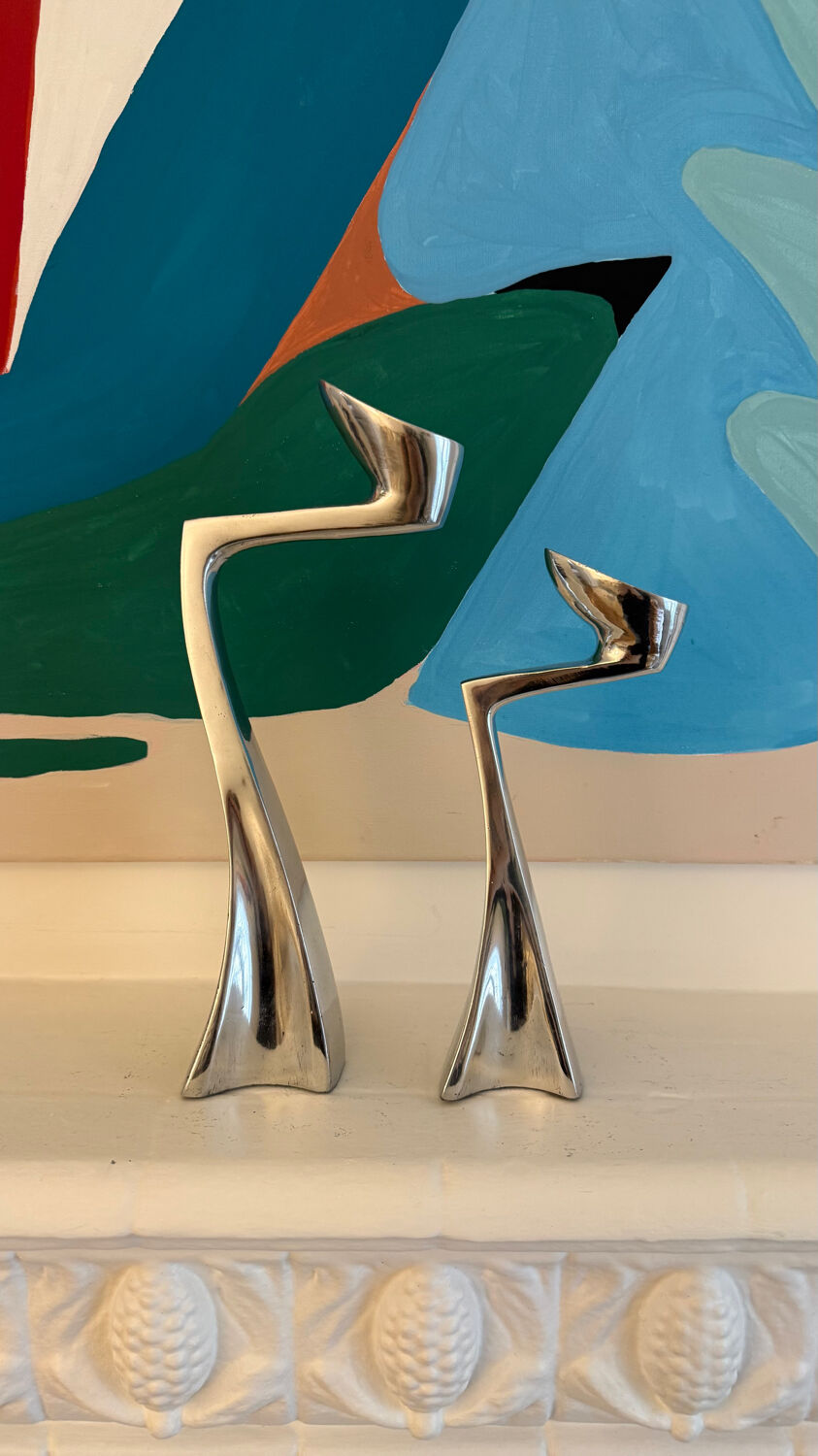 Set of 2 Swann candle holders by Matthew Hilton