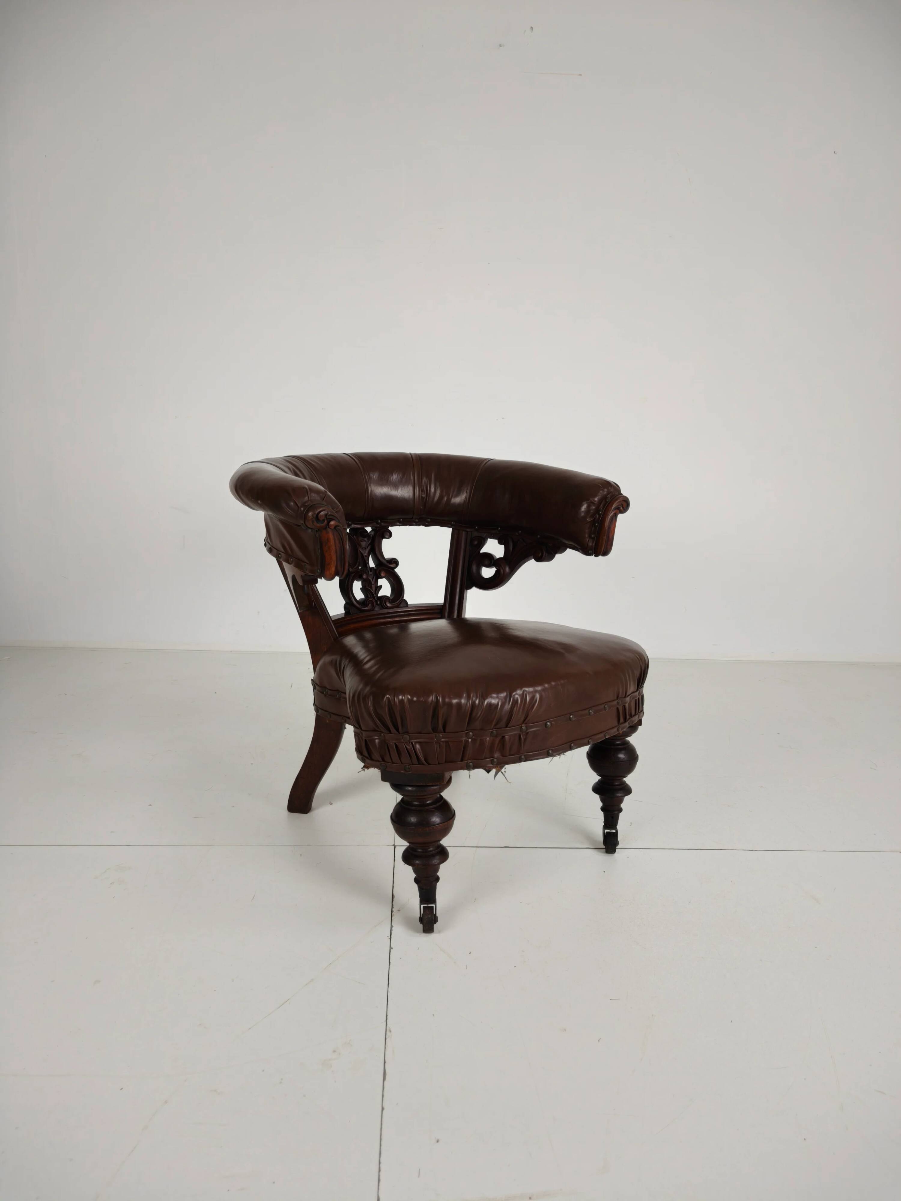 Antique leather armchair by Robson & Son – carved wood & castors, Newcastle