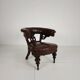 Antique leather armchair by Robson & Son – carved wood & castors, Newcastle