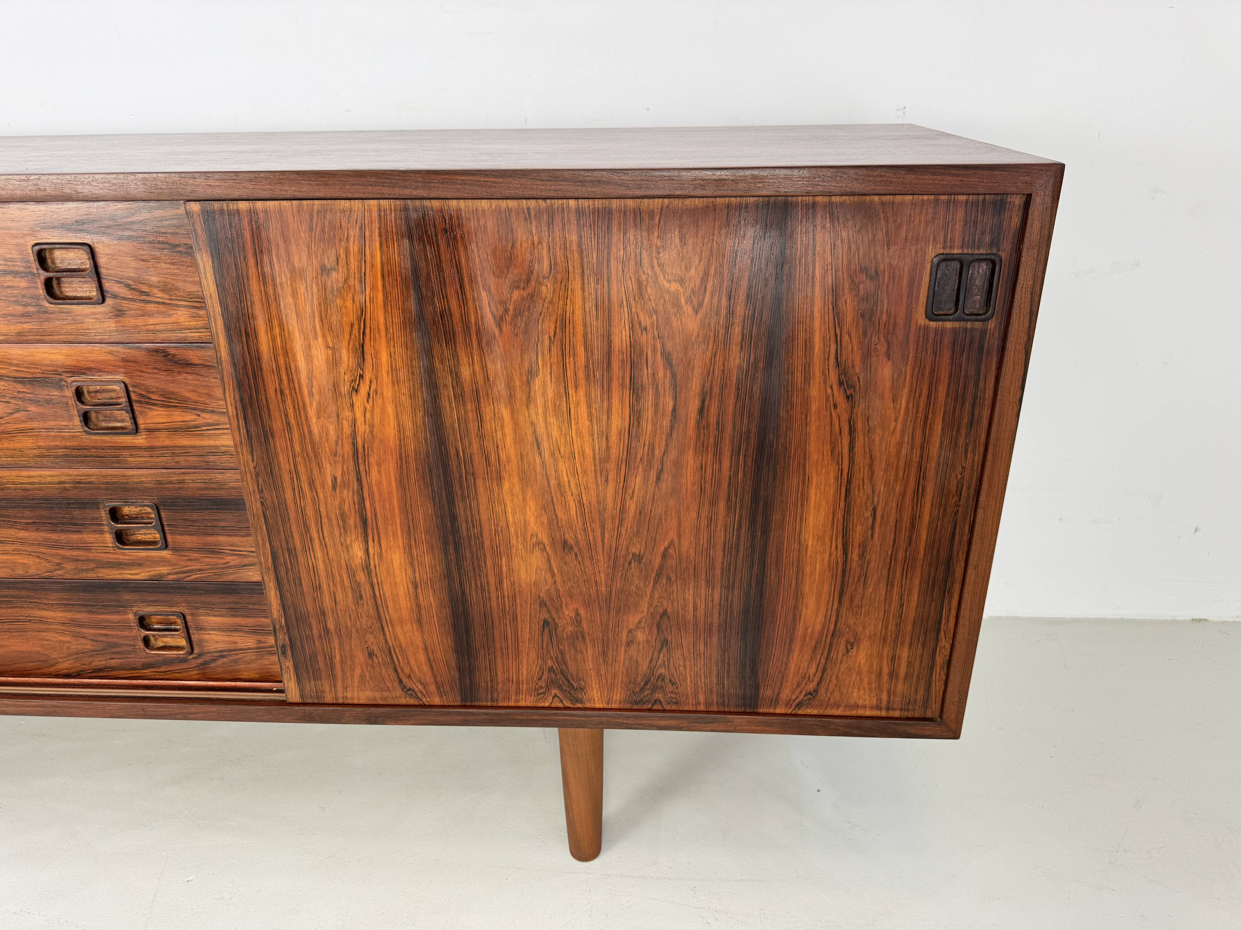 Danish rosewood vintage sideboard with sliding teak doors from the 1960s