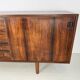 Danish rosewood vintage sideboard with sliding teak doors from the 1960s