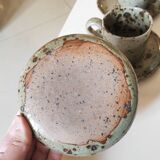 Series of stoneware cups and saucers